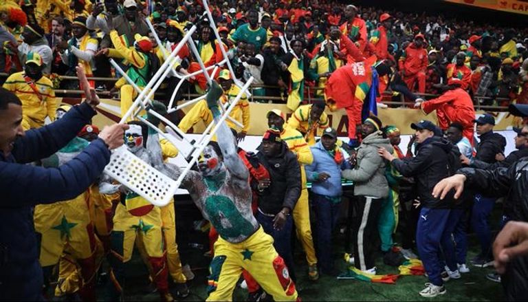 100-120229-senegal-fans-riot-morocco-final_700x400